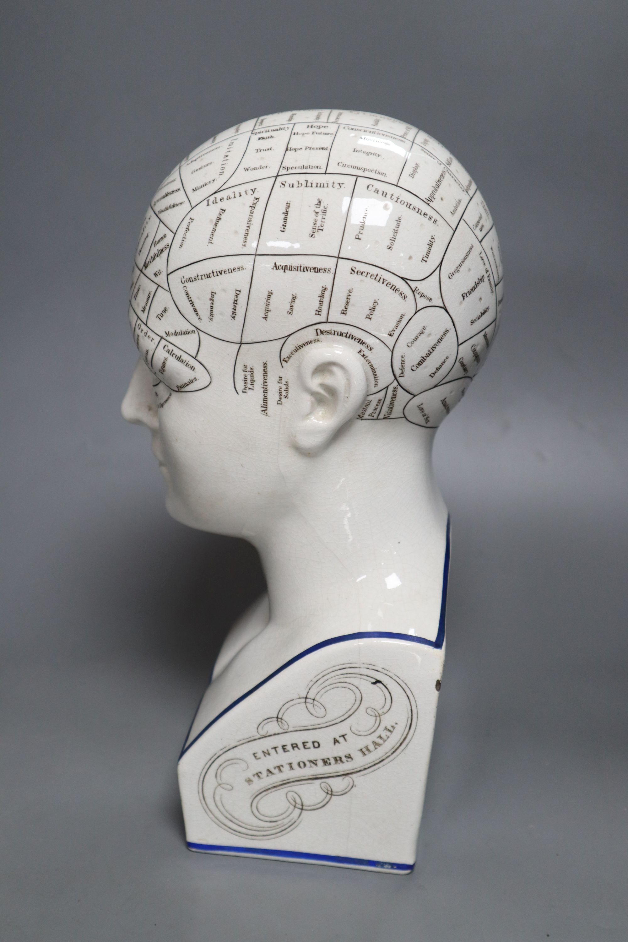 An L.N. Fowler pottery phrenology head, late 19th century, height 29cm